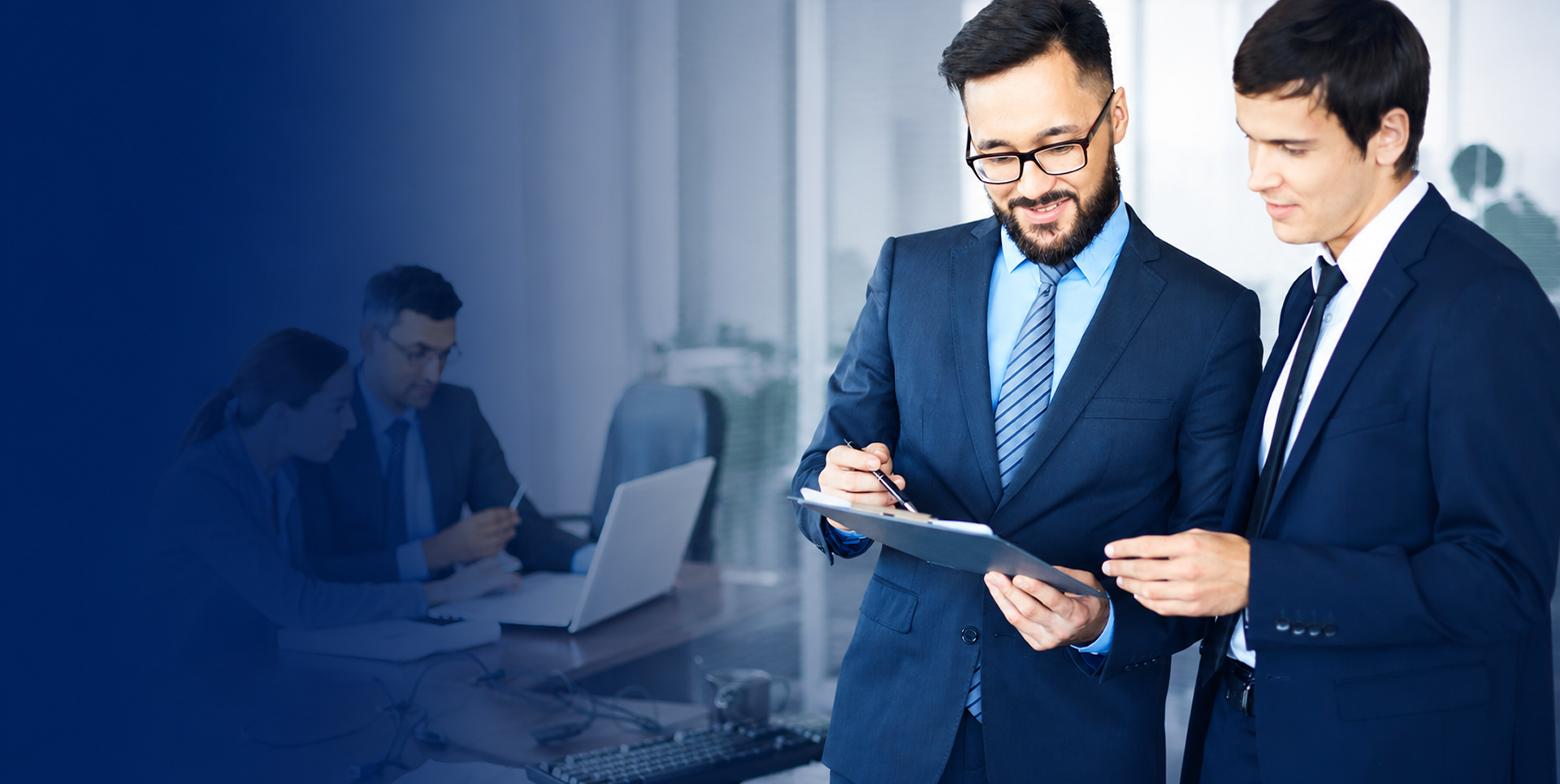 Business professionals reviewing a trademark application